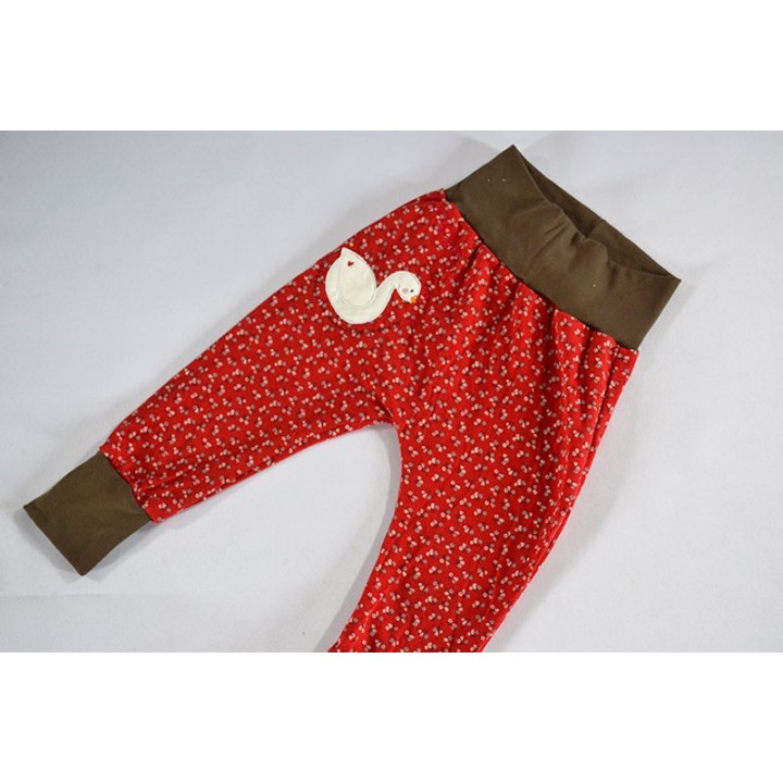 Pantalon sarouel fleurs rouges Swan